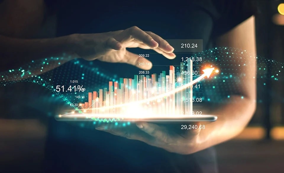 An illustration of data graphs emerging from a tablet screen