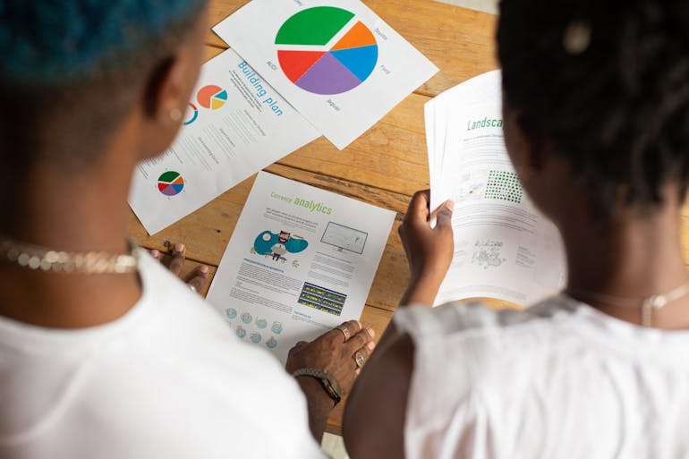 two women analyzing the data