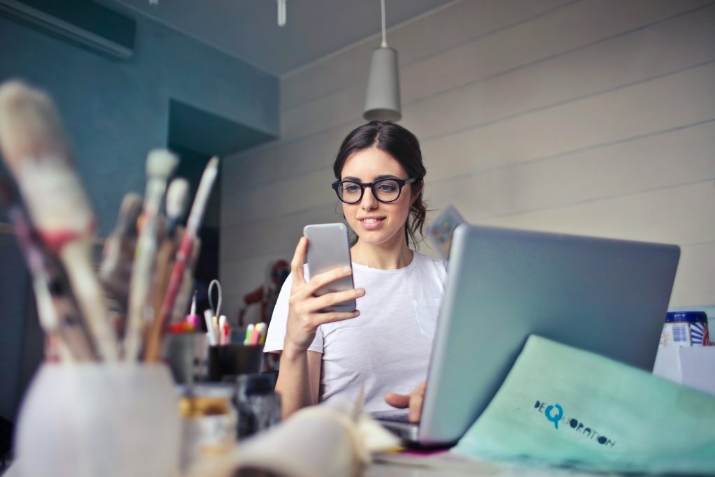 A smiling and happy employee using effective software