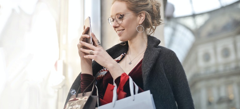 a woman shopping on her smartphone